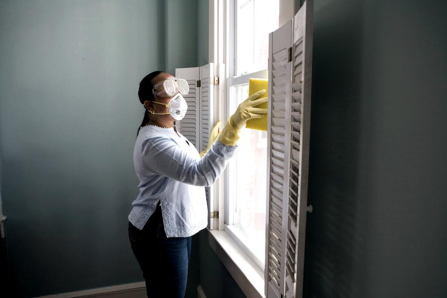 Professional cleaner in a commercial building
